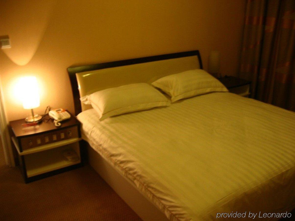 Jiujiu Holiday Hotel Shanghai Room photo