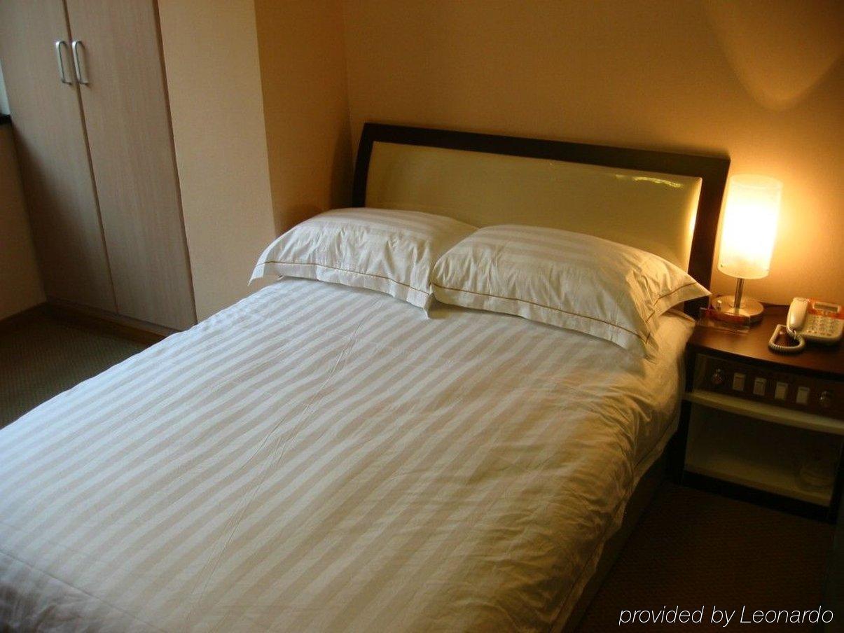 Jiujiu Holiday Hotel Shanghai Room photo